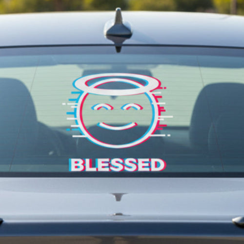 Circular design with a face, halo, and 'BLESSED' text on a white background